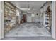 Spacious two car garage with shelves along the walls at 343 E Waterbury Rd, Indianapolis, IN 46227