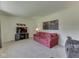 Comfortable living room featuring neutral carpet, cozy seating, and stylish decor at 343 E Waterbury Rd, Indianapolis, IN 46227