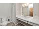 Bathroom featuring a vanity, a large mirror, a toilet and a closet at 3545 Whippoorwill Lake N Dr, Monrovia, IN 46157