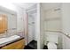 Bathroom featuring a combination shower and tub with marble-style tile surround at 3545 Whippoorwill Lake N Dr, Monrovia, IN 46157