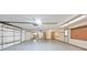 Garage featuring white walls and light gray floor with a storage closet at 3545 Whippoorwill Lake N Dr, Monrovia, IN 46157