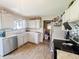 Functional kitchen featuring stainless steel appliances and ample counter space at 3613 N Locust St, Muncie, IN 47304