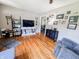 Cozy living room boasting hardwood floors and stylish decor, perfect for relaxation at 3613 N Locust St, Muncie, IN 47304