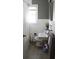 Bright bathroom featuring classic sink, toilet, and shower, complete with essential fixtures and natural light at 3616 N Dearborn St, Indianapolis, IN 46218