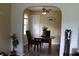 Inviting dining area boasts classic table and chairs, modern decor, and convenient access to natural light at 3616 N Dearborn St, Indianapolis, IN 46218