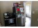 Well-equipped kitchen with modern appliances, including stainless steel refrigerator and range for convenient cooking at 3616 N Dearborn St, Indianapolis, IN 46218