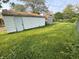 Large backyard with a garage and shed at 3845 N Irvington Ave, Indianapolis, IN 46226