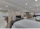 Open basement with a bar, ping pong table, TV, and screening area provides ample entertainment space at 4084 Mountbatton Dr, Greenwood, IN 46143