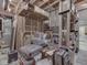 Unfinished basement with exposed wood beams and temporary storage at 4084 Mountbatton Dr, Greenwood, IN 46143