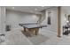 Basement area with ping pong table and a staircase leading to the upper level at 4084 Mountbatton Dr, Greenwood, IN 46143