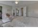 Charming bedroom with decor, including a papasan chair, a decorative rug, and doorways to other rooms at 4084 Mountbatton Dr, Greenwood, IN 46143