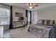 Bedroom with a workstation, ceiling fan, and comfortable decor for relaxation and productivity at 4084 Mountbatton Dr, Greenwood, IN 46143