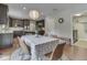 Open dining area adjacent to kitchen featuring updated appliances and finishes at 4084 Mountbatton Dr, Greenwood, IN 46143