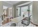 Bright home office with large windows, modern desk, and comfortable chair at 4084 Mountbatton Dr, Greenwood, IN 46143