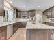 Gourmet kitchen features granite countertops, stainless steel appliances, and custom cabinets at 4084 Mountbatton Dr, Greenwood, IN 46143