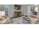 Open-concept living space with hardwood floors, stylish decor, and ample natural light at 4084 Mountbatton Dr, Greenwood, IN 46143