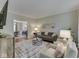 Cozy living room with stylish furniture, area rug, and plenty of natural light at 4084 Mountbatton Dr, Greenwood, IN 46143