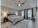 Main bedroom boasts ample natural light, tray ceilings, and stylish decor at 4084 Mountbatton Dr, Greenwood, IN 46143