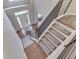 Bright foyer featuring stairs with metal railings and wood treads leading to the second floor at 4084 Mountbatton Dr, Greenwood, IN 46143