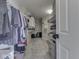 Spacious walk-in closet with ample shelving and storage for clothing and accessories at 4084 Mountbatton Dr, Greenwood, IN 46143