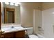 Bathroom featuring a single sink, toilet, and shower-tub, offering essential amenities at 413 Blue Spring Dr, Indianapolis, IN 46239