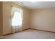 Bedroom boasting neutral walls and carpet with window, creating a bright and comfortable atmosphere at 413 Blue Spring Dr, Indianapolis, IN 46239