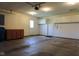 Spacious garage providing ample room for parking, storage, and DIY projects at 413 Blue Spring Dr, Indianapolis, IN 46239