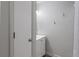 Bathroom featuring a white vanity and sink, with a striped shower curtain at 4155 Rolling Trails Rd, Greenwood, IN 46142