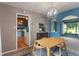 Bright dining room featuring a wood table, view to the kitchen, and arched doorway at 4155 Rolling Trails Rd, Greenwood, IN 46142