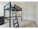 Spacious bedroom featuring a loft bed setup, ideal for a room with closet at 430 Oakbrook Dr, Columbus, IN 47201