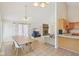 Inviting living space with kitchen, dining area, and living room in an open concept layout at 430 Oakbrook Dr, Columbus, IN 47201