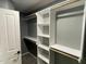 Spacious walk-in closet with custom shelving and ample storage space at 4420 Wild Turkey Dr, Indianapolis, IN 46239