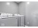 Convenient laundry room with modern Samsung washer and dryer units at 4420 Wild Turkey Dr, Indianapolis, IN 46239