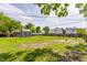 Large backyard with a shed featuring a spacious lawn ready for outdoor activities at 48 Wilson Dr, Carmel, IN 46032