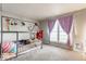 Playful bedroom with unique bed frame, bright natural light, and spacious carpeted floors at 48 Wilson Dr, Carmel, IN 46032