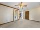Spacious living room with easy access to the kitchen and outdoor space at 5032 Monticello Dr, Columbus, IN 47203