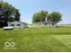 Exterior view of the home, garage, and surrounding green lawn at 535 S 450 E, Franklin, IN 46131