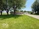 Single-story home with an oversized two-car garage, featuring a well-maintained front lawn at 535 S 450 E, Franklin, IN 46131