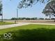 Expansive front yard with lush green grass and distant view of neighboring farmland at 535 S 450 E, Franklin, IN 46131