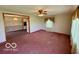 Cozy living room featuring plush carpeting and traditional-style window treatments at 535 S 450 E, Franklin, IN 46131