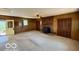 Cozy living room featuring a brick fireplace and access to the outdoors at 535 S 450 E, Franklin, IN 46131
