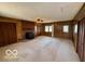 Spacious living room with wood paneling, fireplace and natural light at 535 S 450 E, Franklin, IN 46131