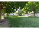 Expansive backyard with lush greenery and mature trees at 5609 Meadowood Dr, Indianapolis, IN 46224