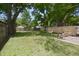 Backyard features large yard, fire pit and a new wooden fence at 5636 Crittenden Ave, Indianapolis, IN 46220