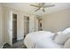 Bedroom featuring hardwood floors, ceiling fan and closet with open doors at 5636 Crittenden Ave, Indianapolis, IN 46220