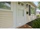 Close-up of the front door and well-maintained exterior at 5636 Crittenden Ave, Indianapolis, IN 46220
