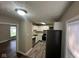 Modern kitchen with white cabinets, and stainless steel refrigerator at 5704 N Keystone Ave, Indianapolis, IN 46220
