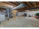 Spacious unfinished basement with utilities, and ample room for potential customization at 5923 W 29Th Pl, Indianapolis, IN 46224