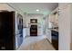 Modern kitchen with stainless steel appliances and sleek black countertops at 5923 W 29Th Pl, Indianapolis, IN 46224