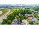 Aerial view of the house, highlighting the surrounding neighborhood with greenery and nearby urban amenities at 602 Prospect St, Indianapolis, IN 46203